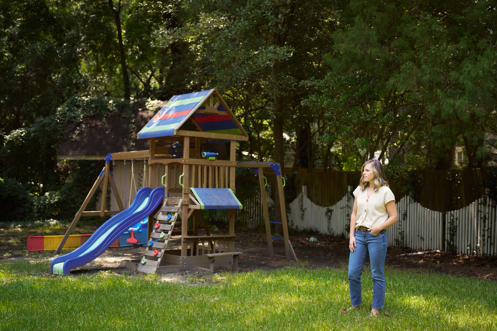 Image may contain Grass Plant Play Area Outdoor Play Area Outdoors Person Teen Backyard Nature Yard and Clothing