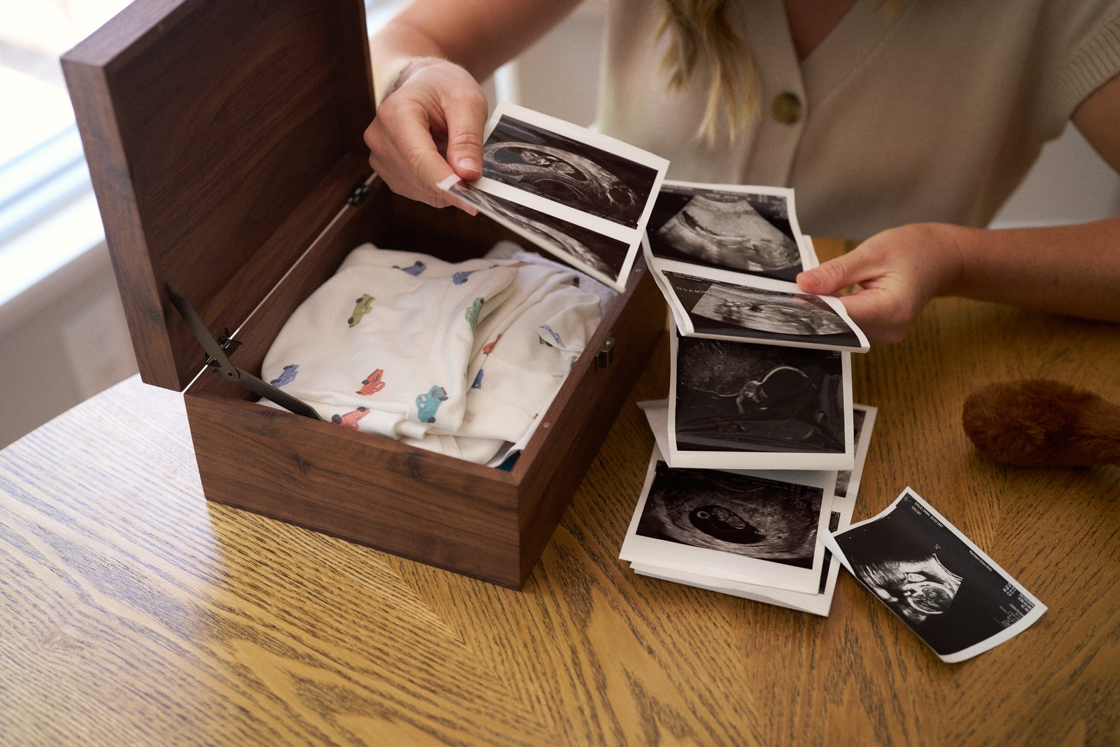 Image may contain Child Person Box Hardwood Wood Book and Publication